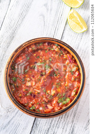 Bowl of salsa 112065684