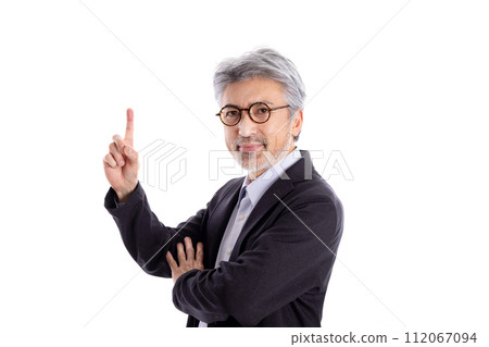 Gray-haired man wearing a jacket pointing Gray-haired man wearing a jacket pointing 112067094
