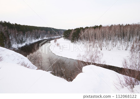 No people landscape shot of picturesque mountains, forest and river on frosty winter day No people landscape shot of picturesque mountains, forest and river on frosty winter day 112068122