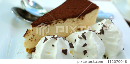 Soft focus on a cheesecake with cannolis on top. . High quality photo 112070048