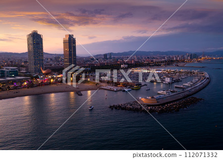 Aerial view of seaside area of Barcelona in summer dusk, Spain 112071332