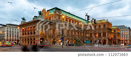 Central avenue of Vienna and illuminated State Opera on winter twilight Central avenue of Vienna and illuminated State Opera on winter twilight 112071663