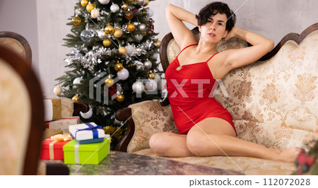 exciting woman in red peignoir posing exciting woman in red peignoir posing 112072028