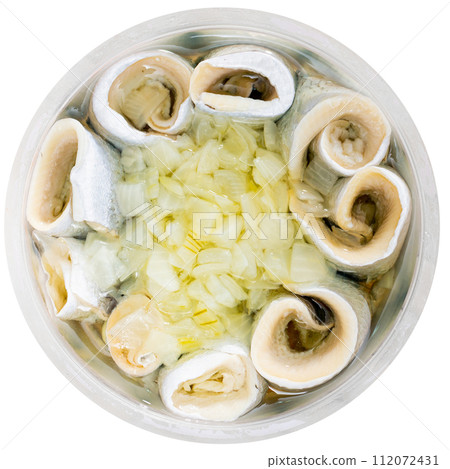 Marinated herring with onions and spice in plastic jar Marinated herring with onions and spice in plastic jar 112072431