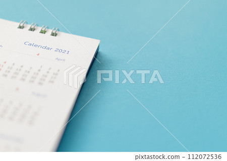 2021 calendar page on blue background business planning appointment meeting concept 2021 calendar page on blue background business planning appointment meeting concept 112072536