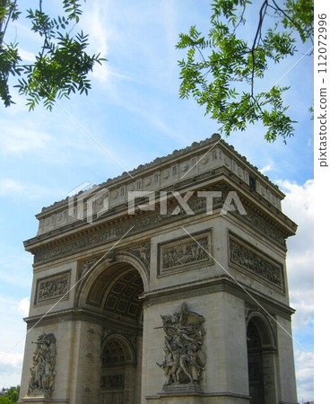 The Arc de Triomphe in Paris, France against the blue sky 112072996