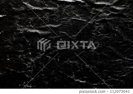 Black damaged cardboard paper overlay texture background 112073041