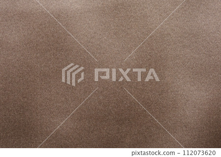 brown fabric texture background closeup 112073620