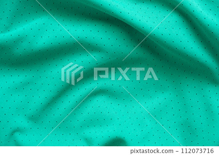 Green sports clothing fabric football shirt jersey texture background Green sports clothing fabric football shirt jersey texture background 112073716