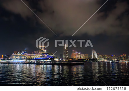 A beautiful night view of Yokohama Minato Mirai from Tokyo Bay. On board Tokai Kisen's Salvia Maru on the Tokyo Bay-Izu Islands route. 112073836