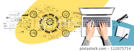 Future technology concept with person using a laptop 112075714