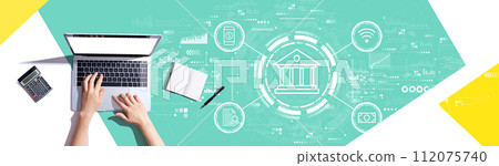 Online banking concept with person using a laptop 112075740