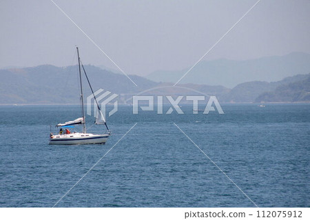 Seascape towards Omishima Island from near Imabari Daikakuhana 112075912