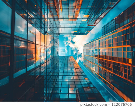 Urban Skyline Modern Office Building Reflecting Cityscape in Glass  112076706