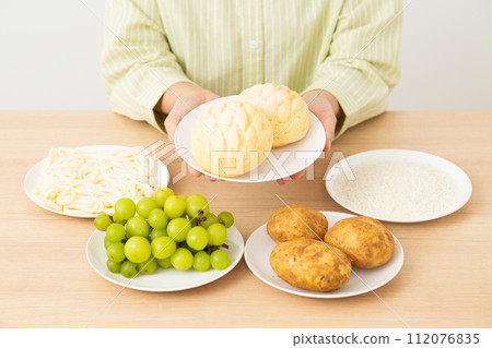 Foods high in sugar (carbohydrates) and middle-aged women Foods high in sugar (carbohydrates) and middle-aged women 112076835