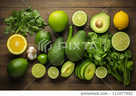Flat lay Healthy vegetarian vegan food ingredients green color vegan food clean eating selection. organic raw food concept on wood background top eyes view 112077982