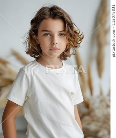 Boy's White Short Sleeve Round Neck T-Shirt Mockup It is a useful tool for clothing designers to help visualize T-shirts before actual production Save time and money and makes it easier to decide. 112078831
