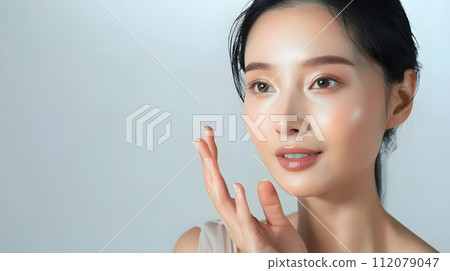 Illustration of a close-up photo of a beautiful young woman's face with good skin posing as a model selling skin care cosmetics. Can be used as an idea for models to pose for advertising shoots. Illustration of a close-up photo of a beautiful young woman's face with good skin posing as a model selling skin care cosmetics. Can be used as an idea for models to pose for advertising shoots. 112079047