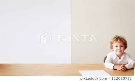 Little Boy Sitting at Table Little Boy Sitting at Table 112080782