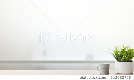 A Table With a Plant and a Cup A Table With a Plant and a Cup 112080798