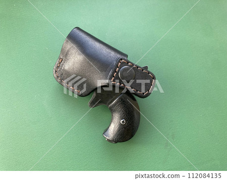 Revolver with holster for concealed carry of weapons Revolver with holster for concealed carry of weapons 112084135