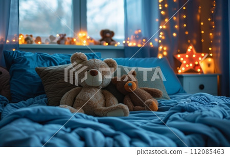 a blue bed with decorative pillows, stuffed animals and lights a blue bed with decorative pillows, stuffed animals and lights 112085463