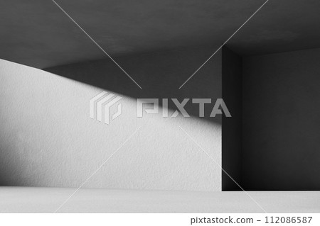 A black and white background with light coming through the building structure. 112086587
