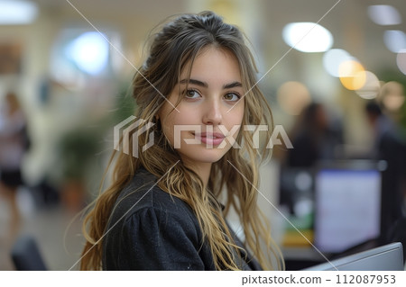 beautiful young woman in the office with her computer beautiful young woman in the office with her computer 112087953