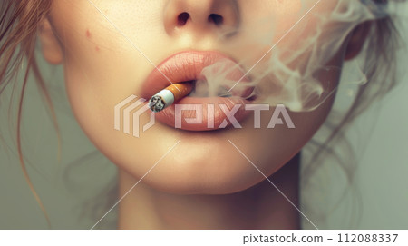 Close-Up of Red Lips Smoking a Cigarette 112088337