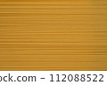 Spaghetti Pasta Lined Texture Yellow Background 112088522