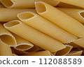 Assorted Uncooked Penne Pasta Close-Up 112088589