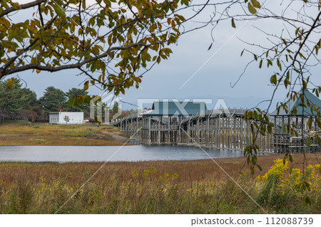 Tsuru no Mai Bridge over Lake Tsugaru Fujimi in Kitatsugaru District, Aomori Prefecture, Japan 112088739
