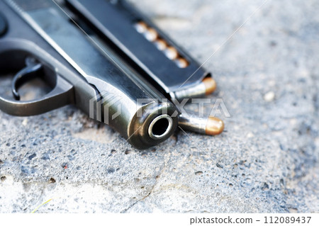 Bullets Near Handgun 112089437