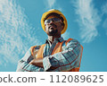 African American engineer with protective helmet and vest 112089625