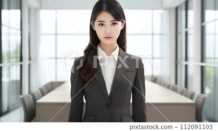 young business woman standing in the office 112091103