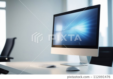 Computer screen on a desk at a bright clean industrial style office Interior. PC monitor White table, large window. No People. Working business concept. Empty workplace, organised workspace. 112091476