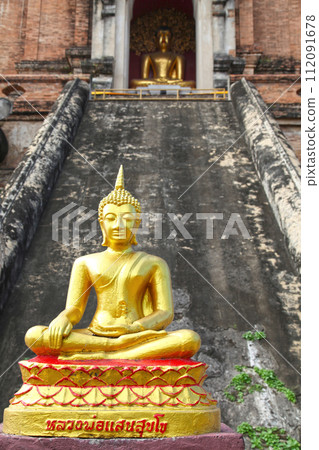 Buddha statues at Wat Chedi Luang in Chiang Mai 112091678