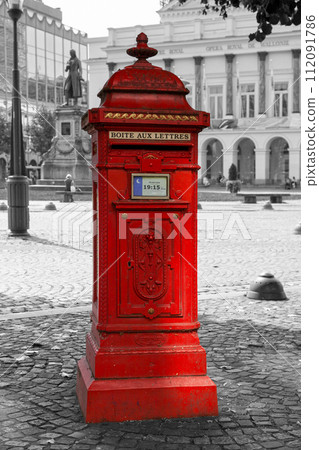 Color isolated red postbox in Liege Color isolated red postbox in Liege 112091786