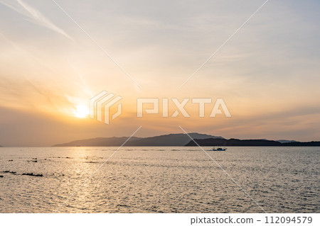 Kitan Strait at sunset in Kada, Wakayama Prefecture 112094579