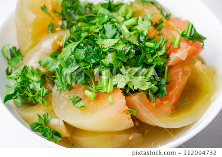 Salted tomato with chopped parsley, healty food 112094732