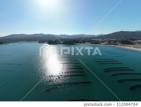 Aerial view of Shizugawa Bay fish farm Aerial view of Shizugawa Bay fish farm 112094784