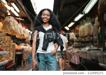 Asian woman enjoy travel in downtown district Asian woman enjoy travel in downtown district 112095271