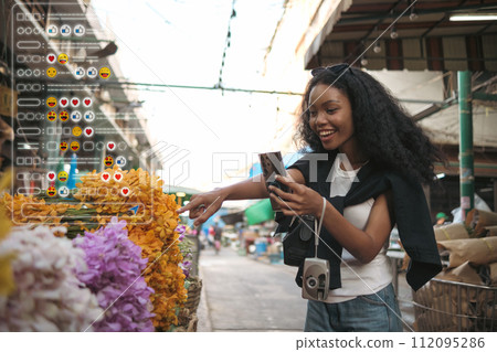 Asian woman enjoy travel in  downtown district 112095286