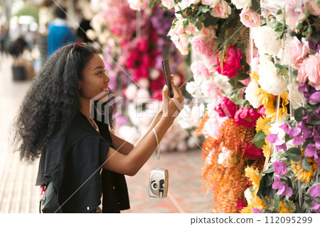 Asian woman enjoy travel in  downtown district 112095299