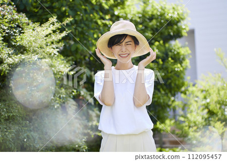 Beauty of a young woman in the green 112095457