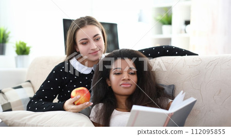 Afro-american female on couch 112095855
