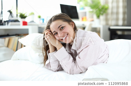 Woman relaxing at home Woman relaxing at home 112095868