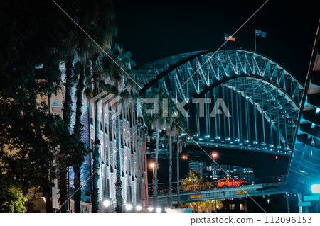 Sydney Bridge illuminated at night Sydney Bridge illuminated at night 112096153