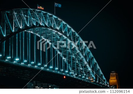 sydney bridge night and flag 112096154