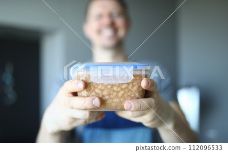 Cheerful repairman and hot meal Cheerful repairman and hot meal 112096533